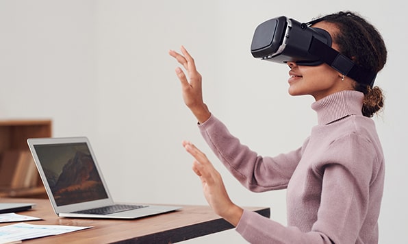 A young woman wearing a VR headset